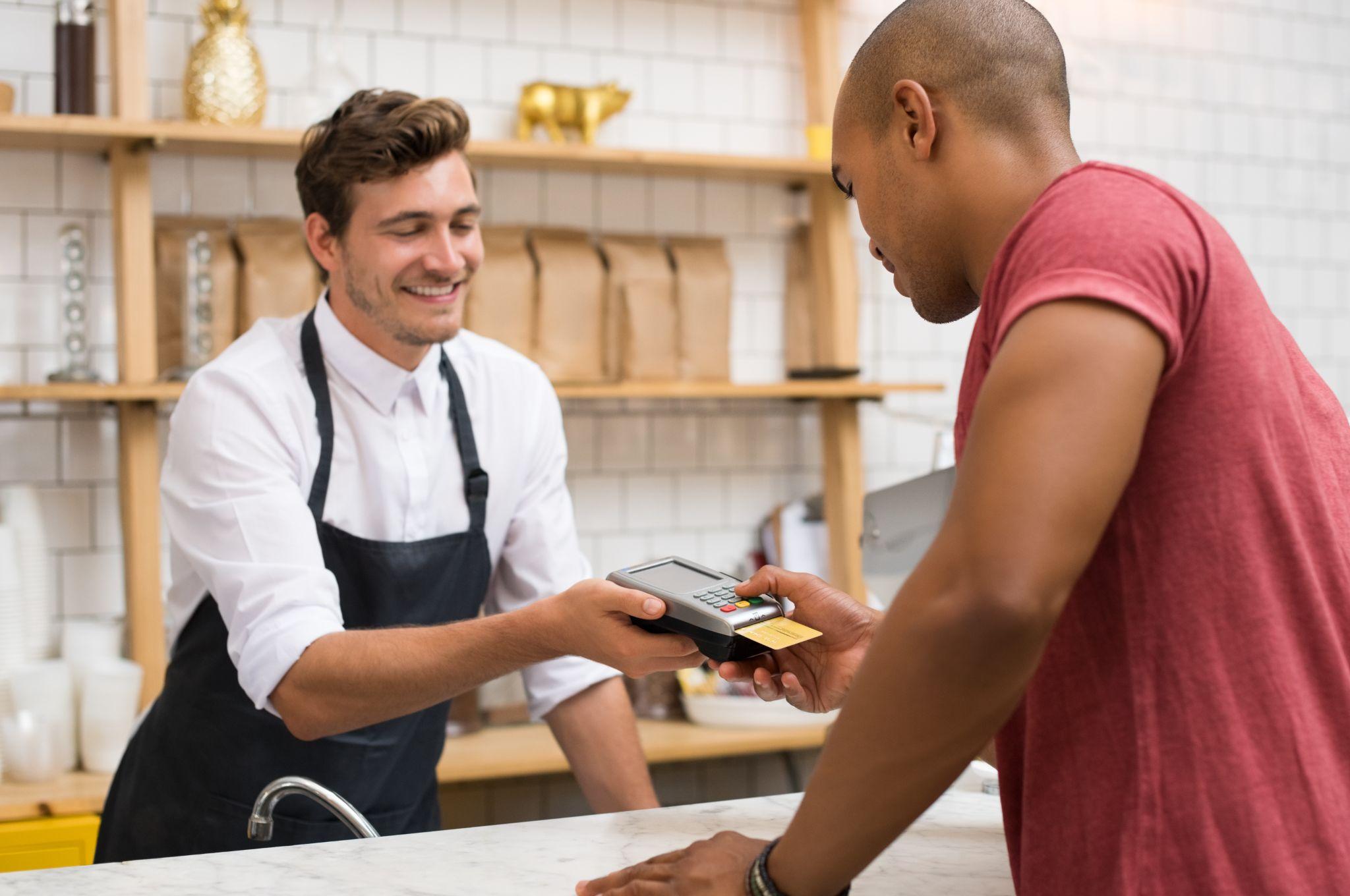 Customer paying with credit card.